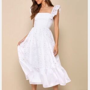 New with tags Lulus “GORGEOUS MEMORY WHITE EYELET BACKLESS RUFFLED MIDI DRESS”